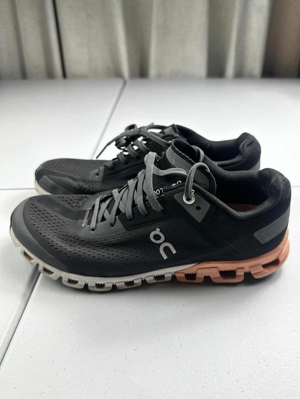 On Running Women's Black & Rose Gold Cloud Sneaker